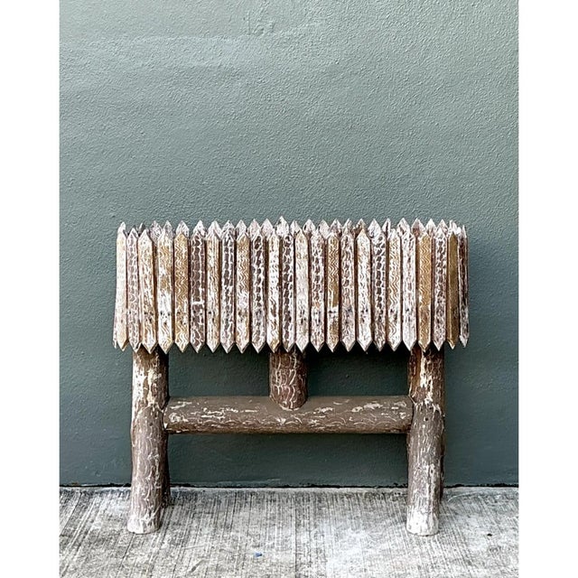 This vintage wood box planter showcases a striking rustic aesthetic, built with a picket-topped vessel of vertical slats,...