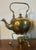 Antique 18th century English George III brass kettle and stand with spirit warming lamp. The kettle's handle partially...