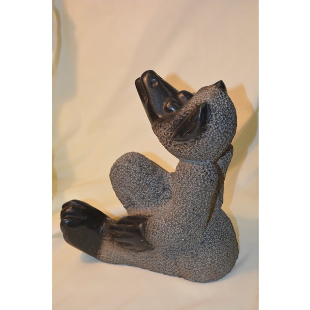 This is a heavy & solid stone sculpture. It was shipped here in the 1980's from Zimbabwe. I believe it is Shona Stone....