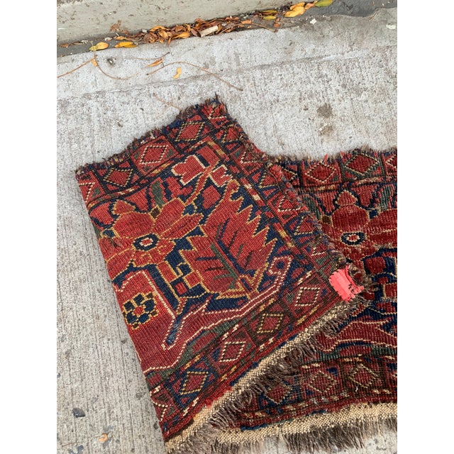 This handmade antique Afghan Ersari Torba rug, crafted in the 1870s, is a stunning and rare piece that celebrates the...
