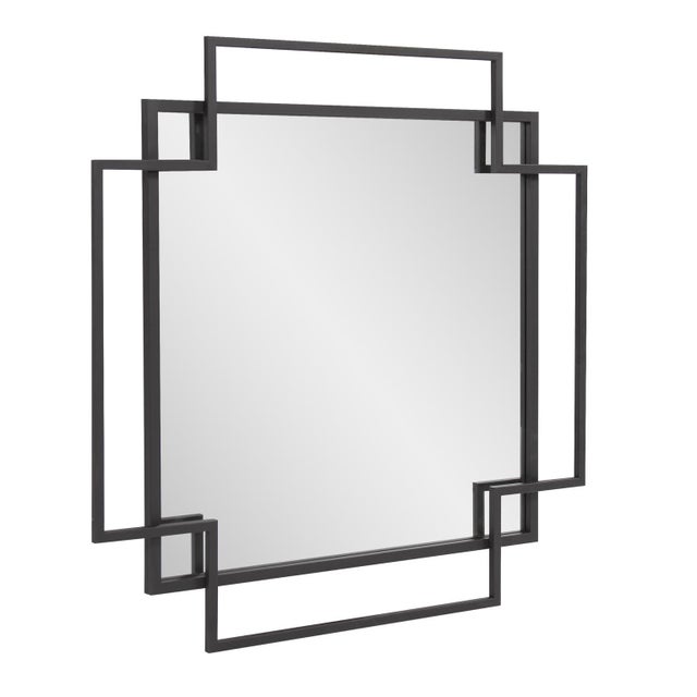 Intersecting geometric metal squares finished in a matte black finish creates the frame of this contemporary styled...