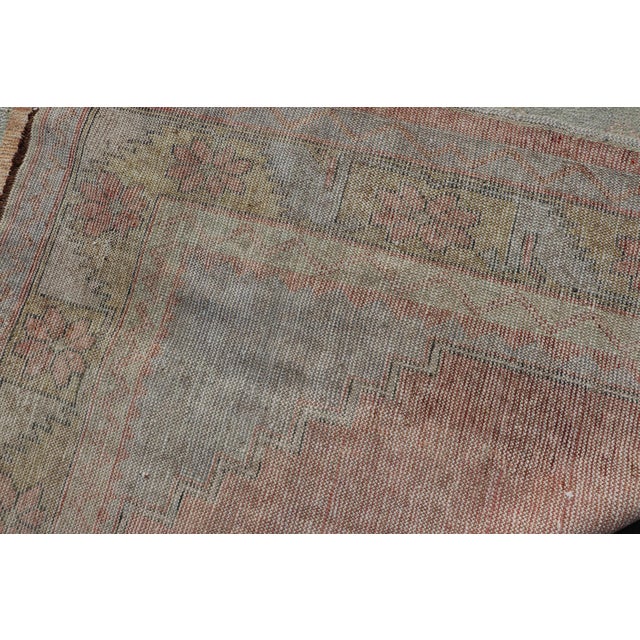 Vintage Turkish Oushak Gallery With Tribal Medallions in Soft Peach and Green For Sale - Image 13 of 13