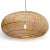 Handwoven pendant light made from finely split rattan with a low-profile silhouette that feels both airy and...