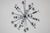 Impressive Italian Space Age Sputnik chandelier, attributed to Goffredo Reggiani, dating from the 1970s. Crafted from...