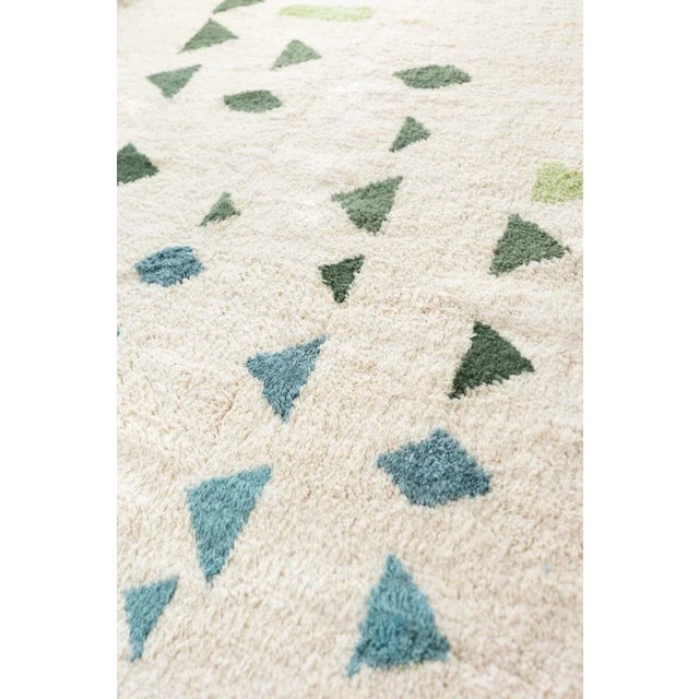 Natural White Moroccan Wool Rug With 5 shades of green organic geometric shapes: Dark forest green, Medium olive green,...