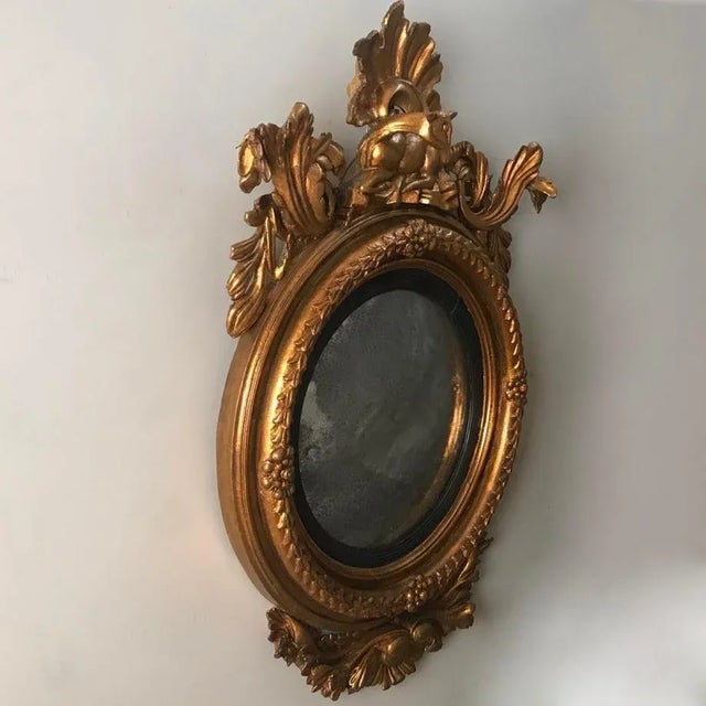 This magnificent piece is surrounded by mesmerizing details, including the acanthus leaves which create a greater...