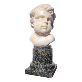 17th Century White Marble Putto Head on a Column For Sale