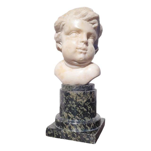 17th Century White Marble Putto Head on a Column For Sale