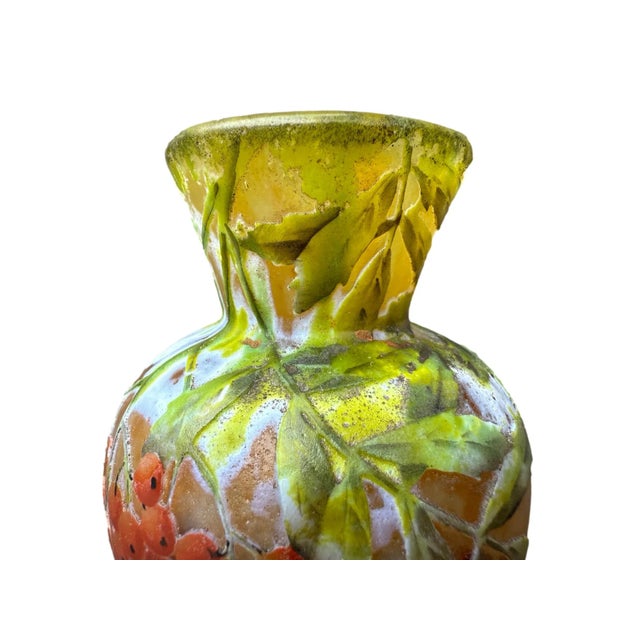 Charming and rare daum nancy small baluster vase with a rounded body, smooth circular base, and a flared, funnel-shaped...