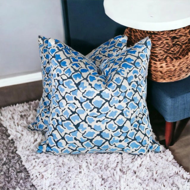This is a unique custom pair of pillow covers. The very unique textile is velvet with a sort of snakeskin or animal fur...