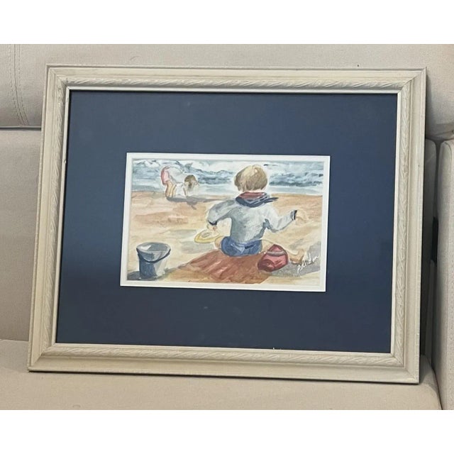 Beautiful vintage watercolor painting of 2 kids playing at the beach. Signed, matted and framed - this painting is ready...