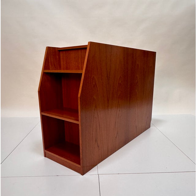 This high quality storage unit in impressive brutalist design was manufactured in Denmark during the 1970s. It is veneered...