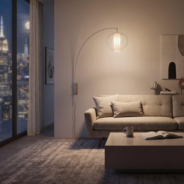 The Sphere Arc Lamp is a contemporary arc lamp featuring a sleek satin nickel finish and a striking sphere white satin...