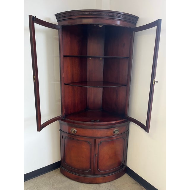 Drexel Cabinet Curved Glass Travis Court Vintage Mahogany. Drexel has been making this Curved Glass Corner Cabinet for...