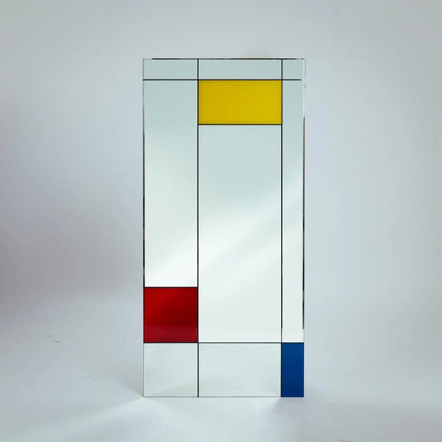 Large wallmirror in the manner of Piet Mondrian by Italian glassmanufacturer Rimadesio. Measures 157 cm x 86 cm. Can be...