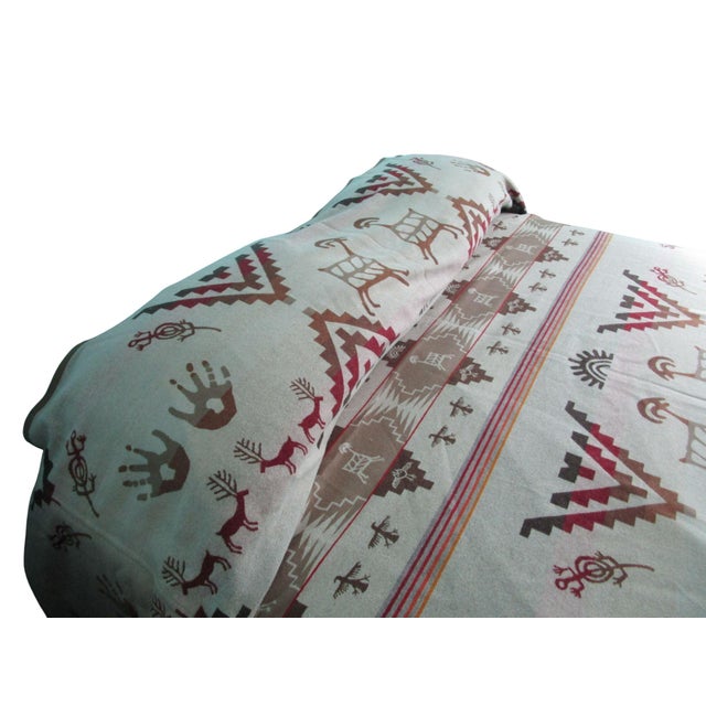 This Pendleton bedspread, featuring a reversible southwest Rock Art Petroglyph pattern, is a timeless piece. Crafted from...