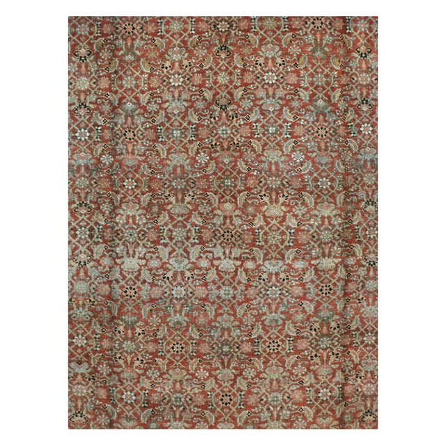 An antique Persian Bidjar room size carpet with a rustic appeal handmade during the early 20th century with a tight...