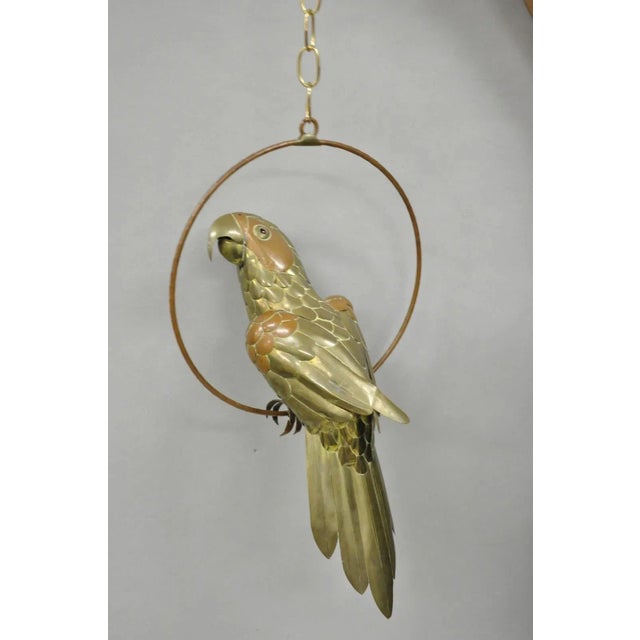Vintage Mid Century Modern Sergio Bustamante Style Brass & Copper Parrot Swing Hanging Sculpture. Circa Mid 20th Century....
