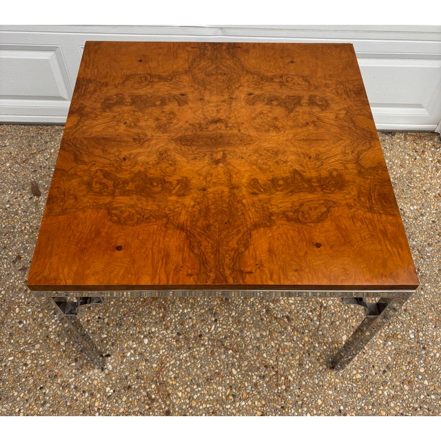 A beautiful mid to late twentieth century burlwood and polished chrome dining table in the style of Milo Baughman. Please...