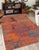 This stunning hand-knotted Afghan Balouchi rug is a captivating addition to any decor. Crafted by skilled artisans, it...