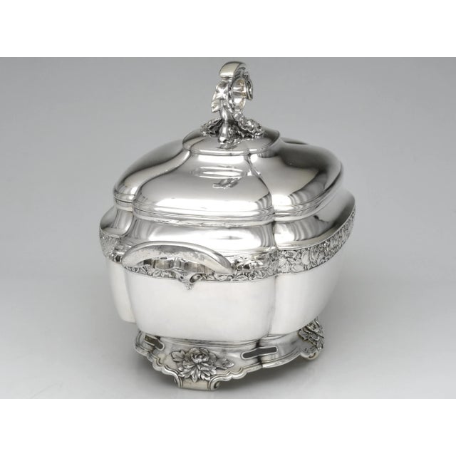 An exquisite Tiffany & Co. sterling silver covered vegetable tureen, pattern number 4627, design number 1901, crafted in...
