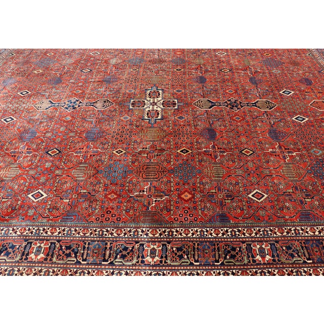 Burnt Orange Antique Joshegan Rug With Rich Red Field, Geometric Motifs and Navy Borders 12 X 16'5 For Sale - Image 8 of 16