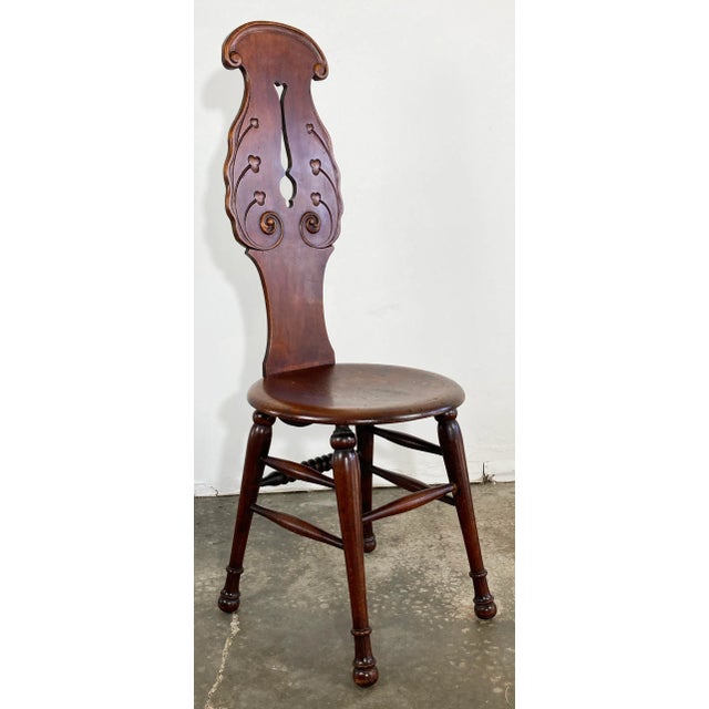 Antique carved wood sewing chair featuring wonderful carved detail, tall 44"H straight back, and carved legs and...