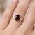 Oval Garnet Marquise Accent Ring in 18K Gold Plated Sterling Silver Product Description Elevate your jewelry collection...