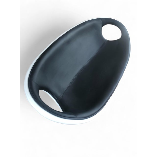 A very glamorous and chic piece of furniture from the italian space age era of the late-1960's. This sculptured fiberglass...