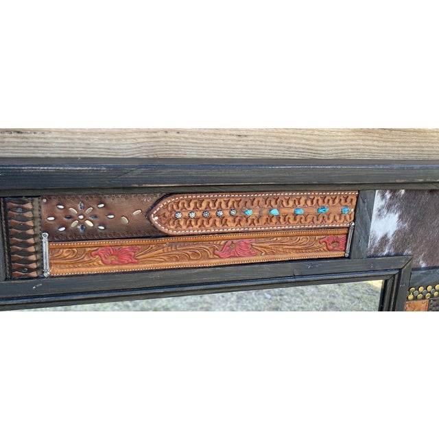 Western Reflections #1 This artful, functional mirror captures the rustic beauty and spirit of the West. Designed to be...