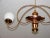 Mid-Century chandelier, 1960s. It was made of brass steel, brass and glass. The chandelier requires 2 bulbs E14....