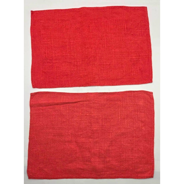 Offered is a set of 4 red woven cotton linen placemats designed by Ritva Puotila for Dansk in the 1970s. They each measure...