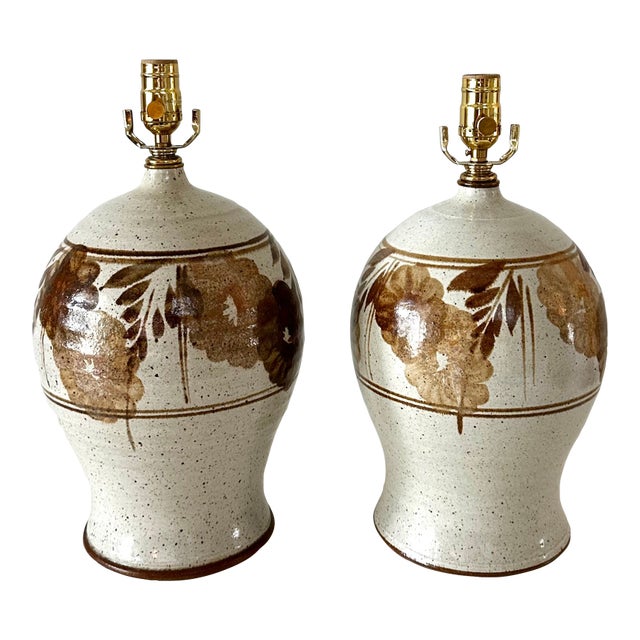 1970s Hand Thrown Stoneware Lamps With Floral Motif - a Pairf For Sale