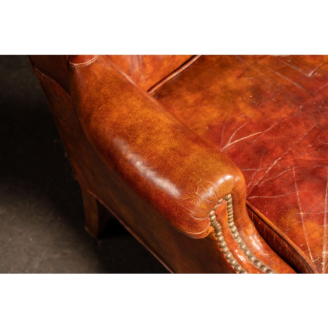 Mid 20th Century Tufted Leather Wingback Armchair in Burnt Amber For Sale - Image 12 of 17