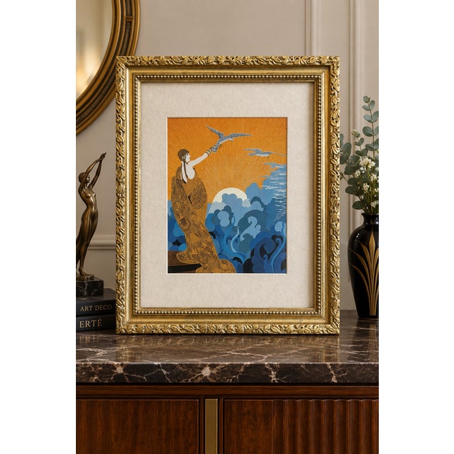 Elegant framed bookplate of “Wings of Victory” by Erté, showcasing the artist’s unmistakable Art Deco style with a...