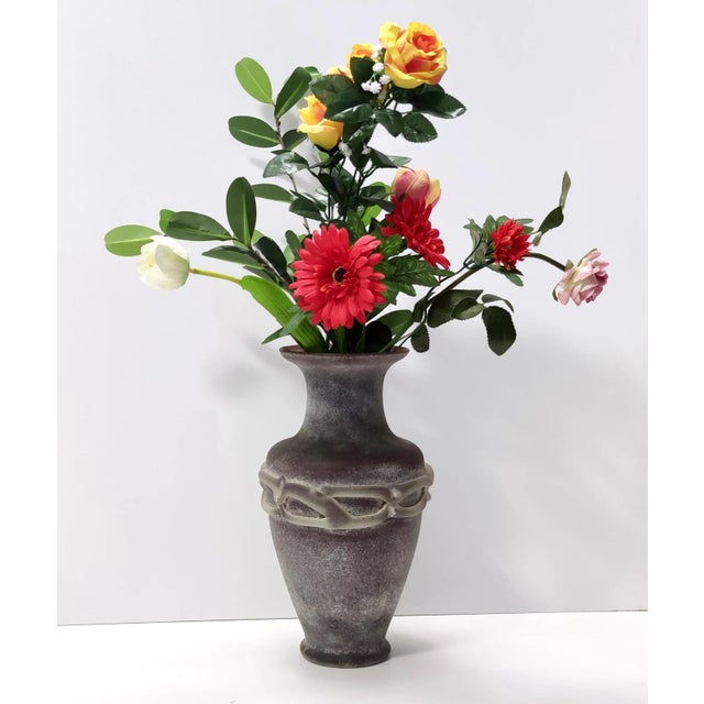 Made in Italy, 1980s. This vase is made in brown scavo hand-molded Murano glass, ascribable to Cenedese or Seguso. It is a...