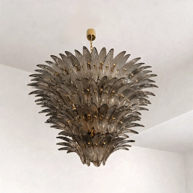 Huge impresiive Gold 24k “palmette” Murano Glass Chandelier. Scenographic chandelier made with “palmette” elements of...