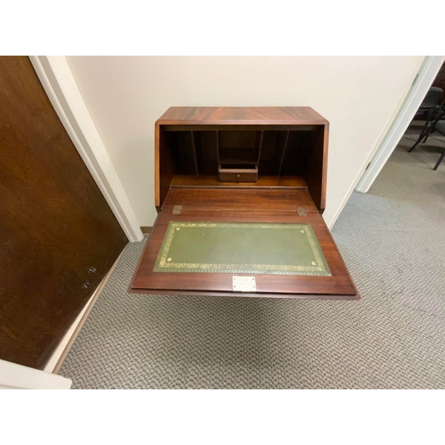 This vintage writing desk is gorgeous and in great condition. Well-built, it has beautiful detailing and patten in the...