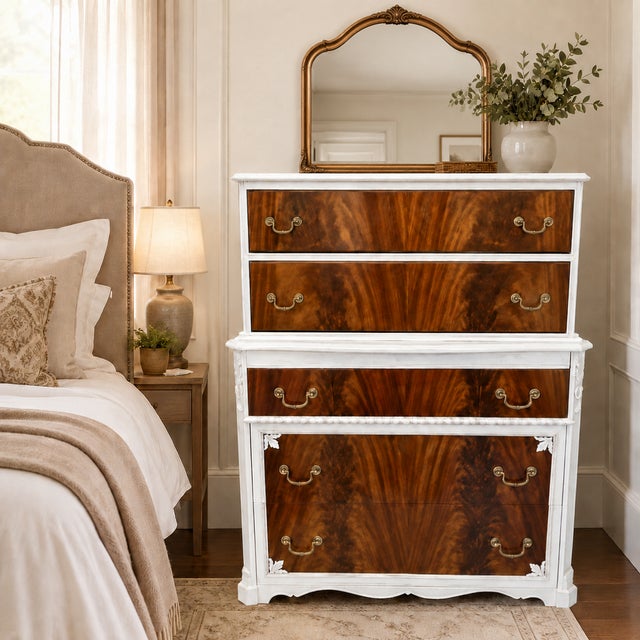 A beautifully updated vintage tall chest featuring spectacular bookmatched flame mahogany veneer drawer fronts paired with...