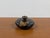 This rare antique Louwelsa Weller art pottery squat vase showcases the masterful hand-painted floral artistry that defines...