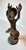 Stunning, authentic vintage West African tribal folk art figurine depicting a traditional musician playing a waist-mounted...