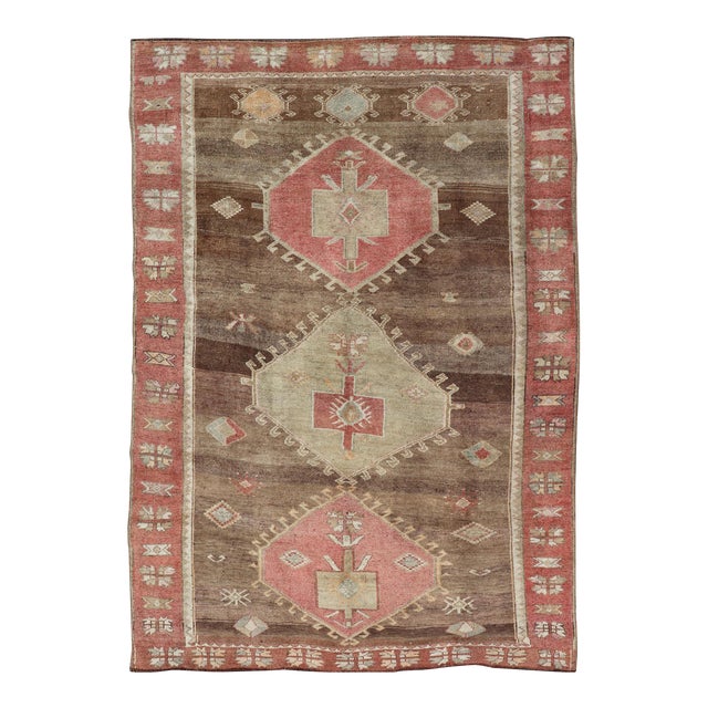 Vintage Turkish Kars Tribal Rug in Earthy Tones With Reds For Sale