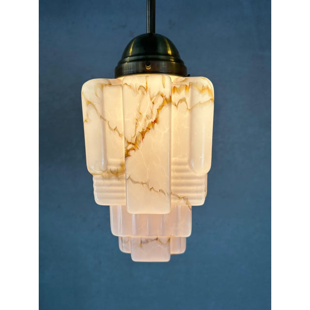 Beautiful Art Deco skyscraper. Rose opaline with amber flames. Brass fixture. Copper/porcelain E27 socket. Rewired. Globe...