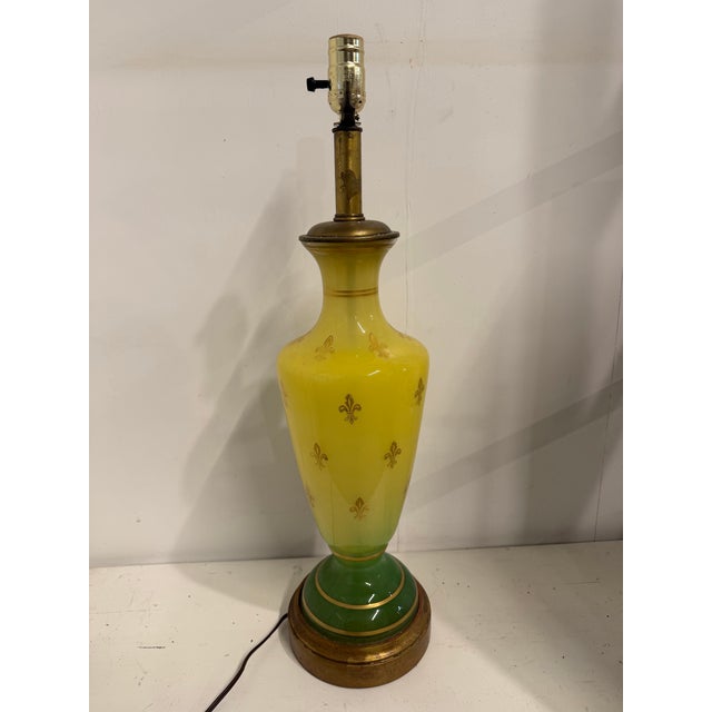 Exquisite late 1960s vintage Hollywood Regency era handmade Fleur de Lis motif hand painted gilt table lamp by Frederick...