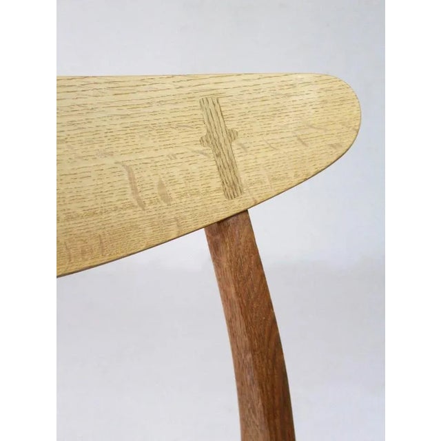 Set of 6 dining chairs designed by Hans J Wegner for Carl Hansen & Son, Denmark 70's. The chairs have an oak frame and a...