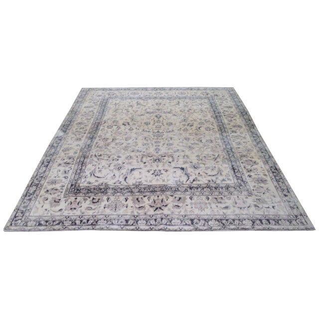 Hand-knotted with care using traditional rug-making techniques, this wool rug blends timeless craftsmanship with a modern...