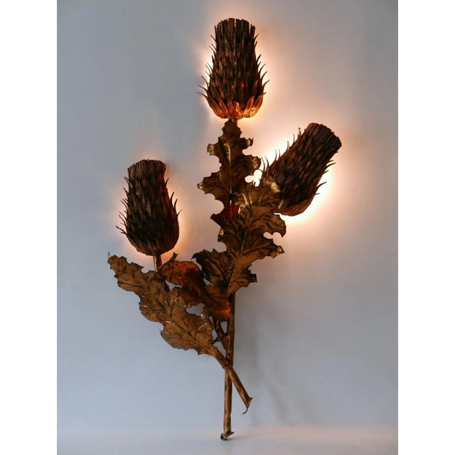 Exceptional, huge and highly decorative mid-century modern three-flamed 'thistle flower' sconce. Designed & manufactured...