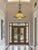 This one‑of‑a‑kind pendant light is a striking fusion of antique craftsmanship and contemporary hand‑blown artistry. Its...