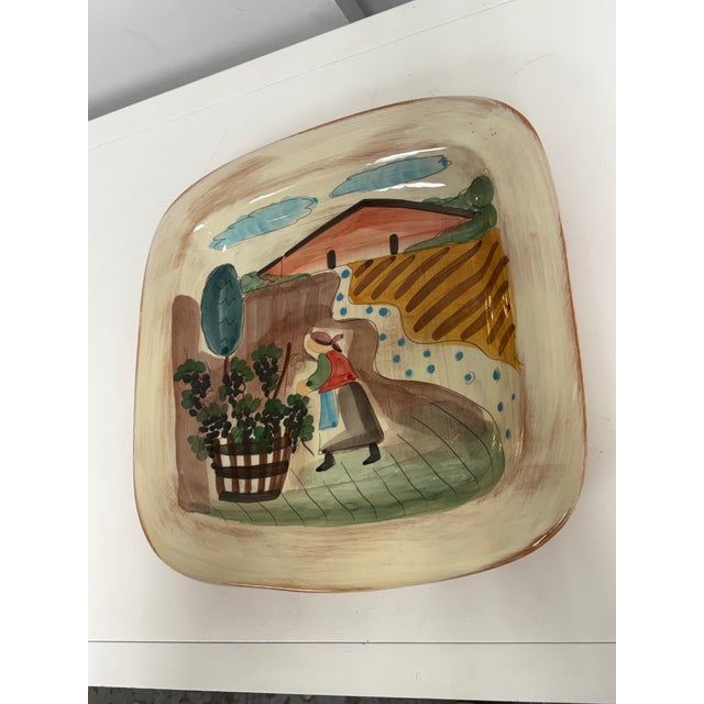 Design Plus Gallery presents the Toscana Square Platter from Vietri. This ceramic platter depicts a grape harvest scene,...