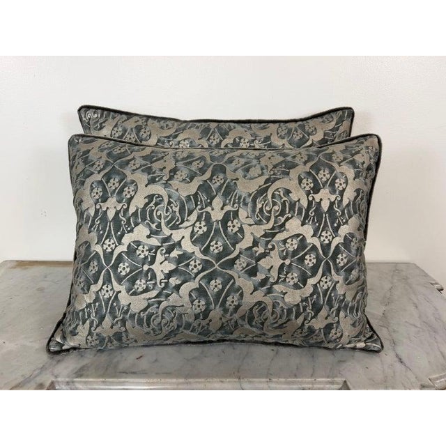 A sublime pair of custom pillows in authentic Mariano Fortuny fabric in his Oneiroi Pattern in urban fog and silver. .The...